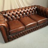 Brown leather chesterfield sofa