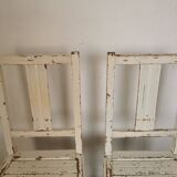 Set of 6 mismatched white chairs
