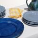 Set of 4 blue ceramic dessert plates.