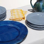 Set of 4 blue ceramic dessert plates.
