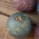 Four bowling balls