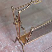 vintage magazine rack, brass and smoked glass magazine rack, newspaper, magazine