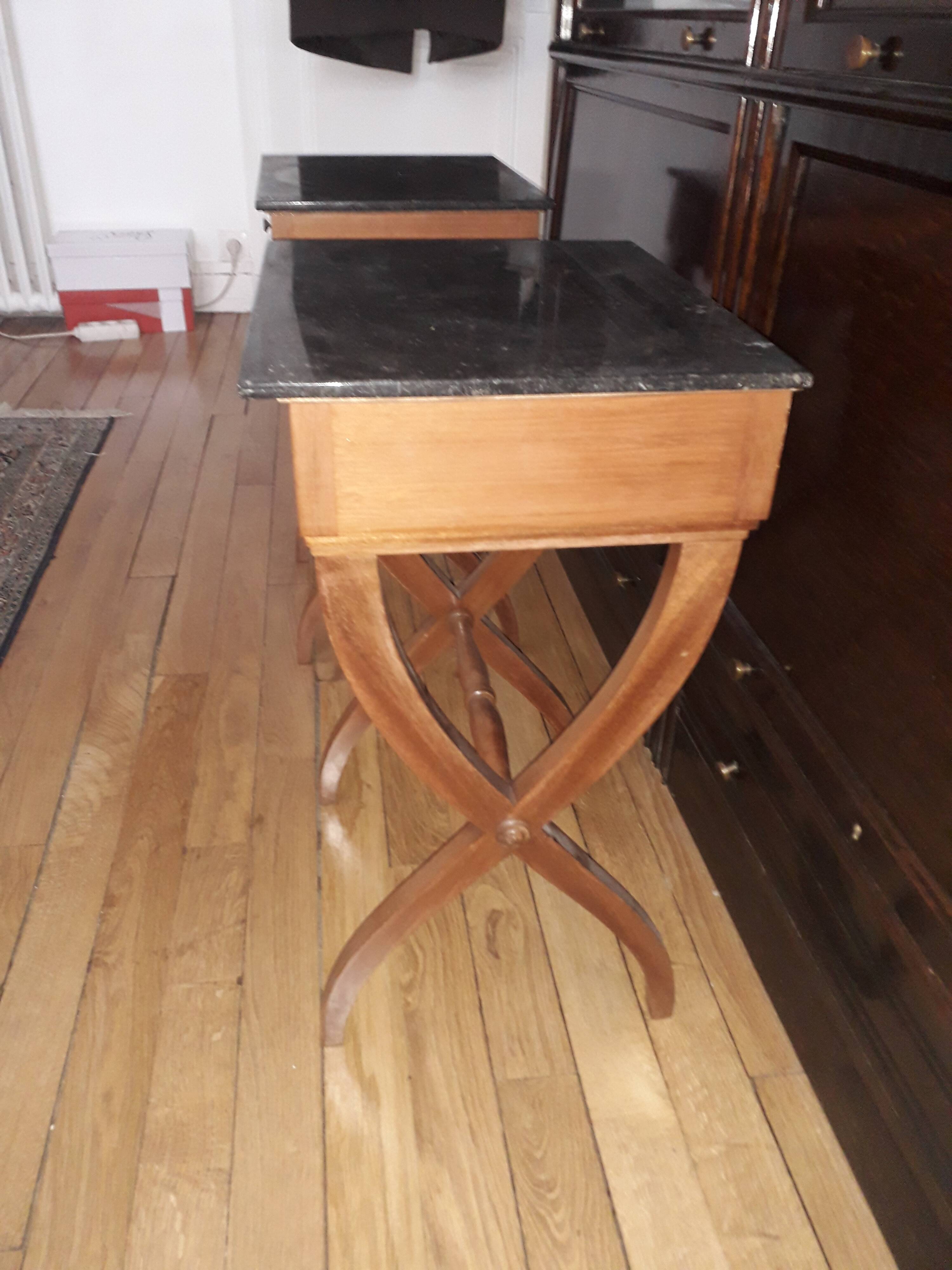 X-footed bedside pair