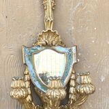 Pair of carved wood sconces