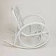 Vintage rocking chair for children in rattan/bamboo.