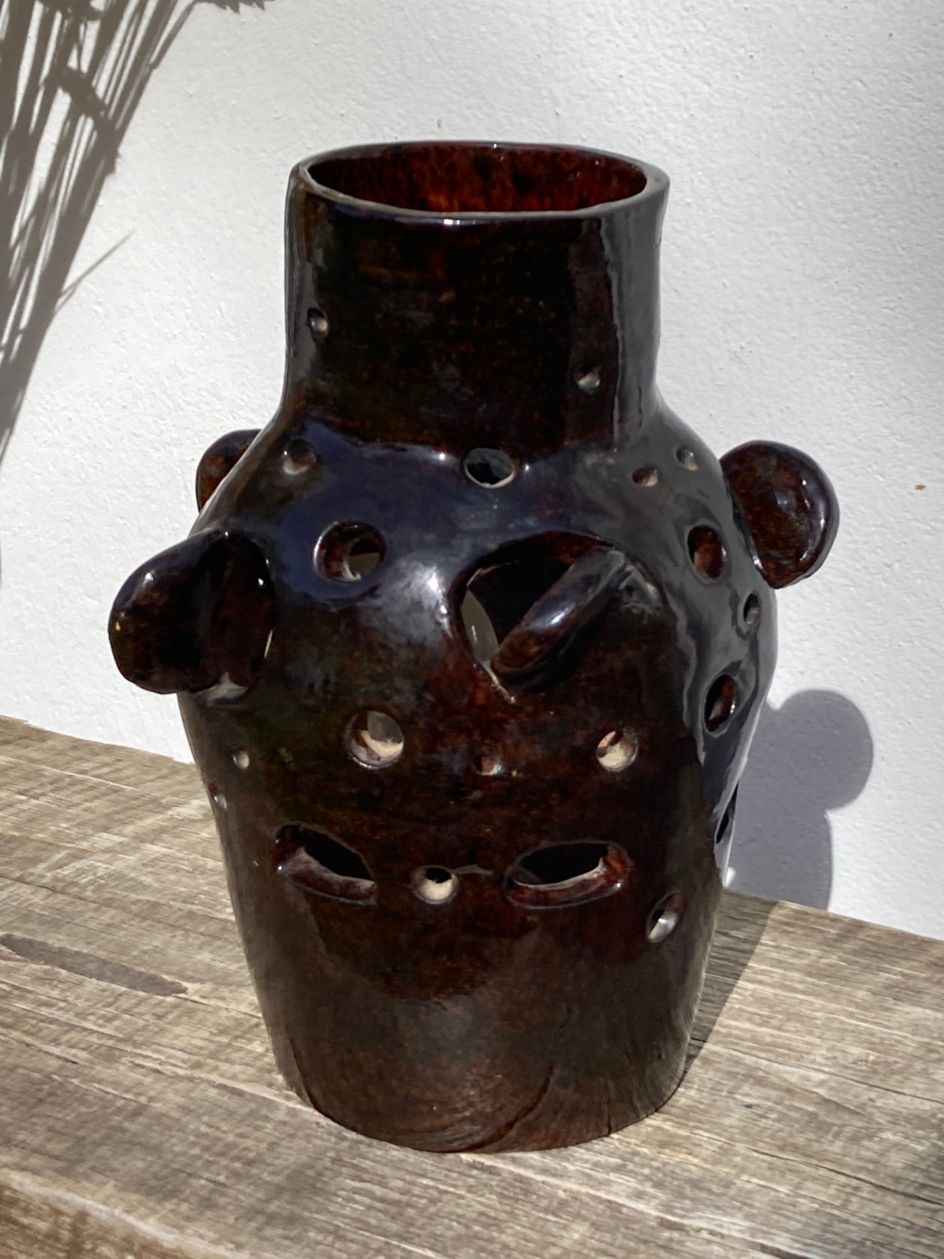 Brutalist lamp in black / brown ceramic openwork 1970