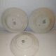 9 vintage dessert plates with Art Deco decor