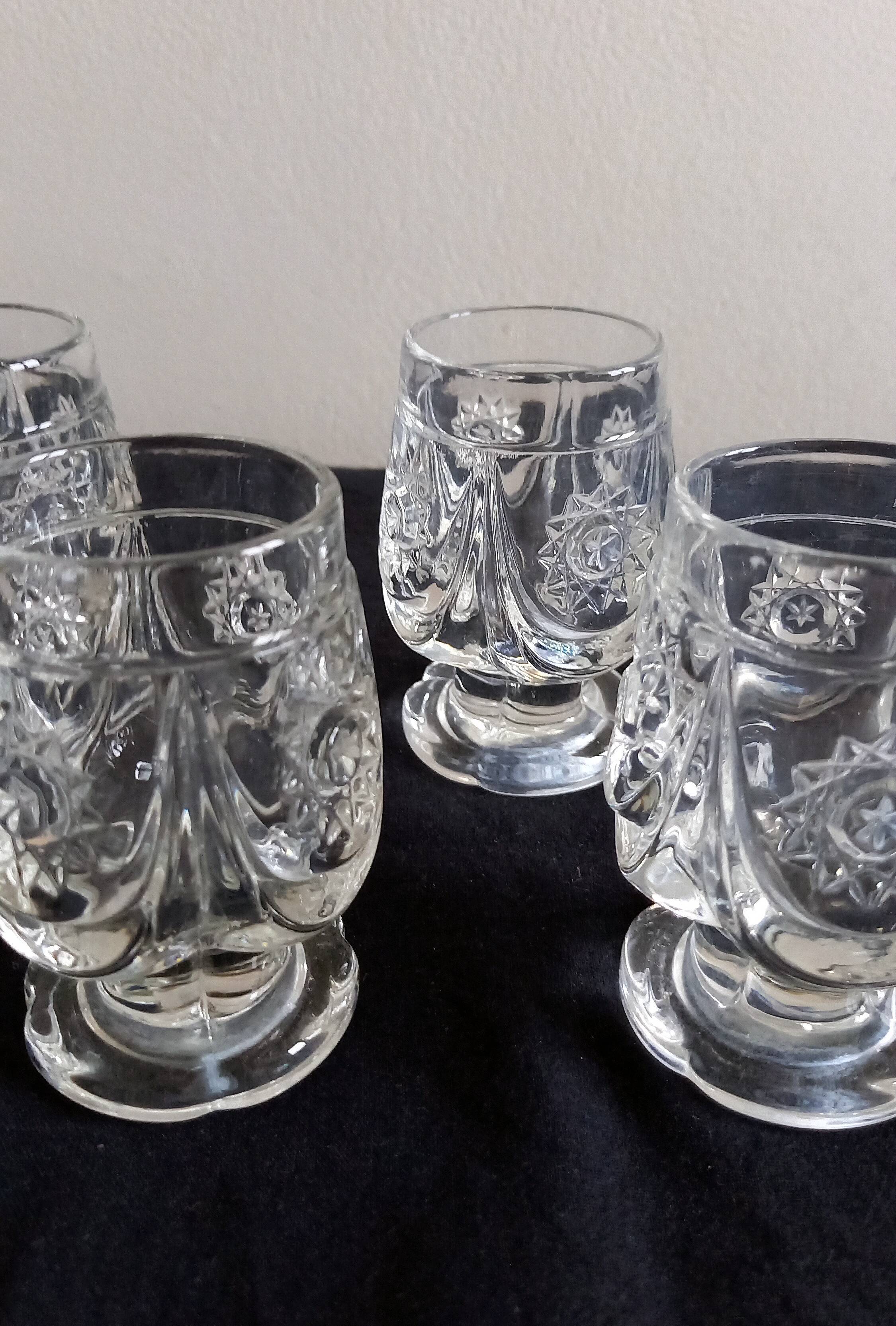 4 antique to digestive glasses in cut crystal and molded crystal decorated