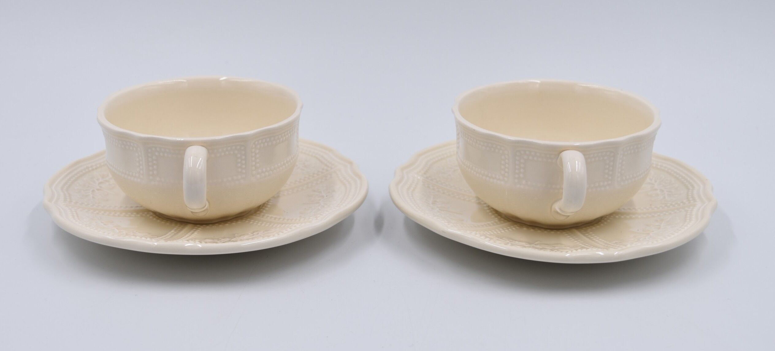 2 luncheon cups off-white earthenware Lunéville décor relief France