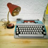 Small articulated desk lamp