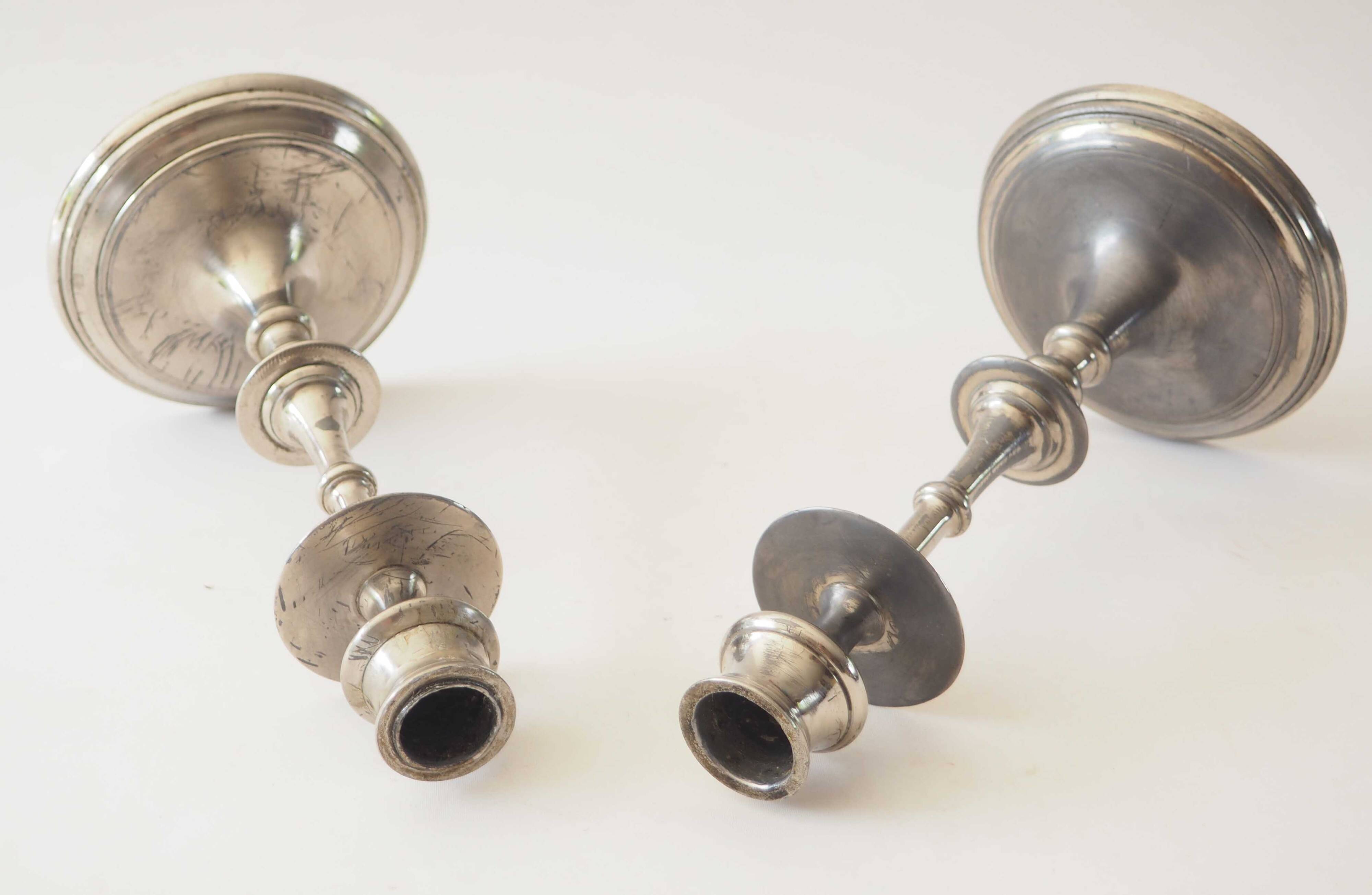 Pair of metal candlesticks