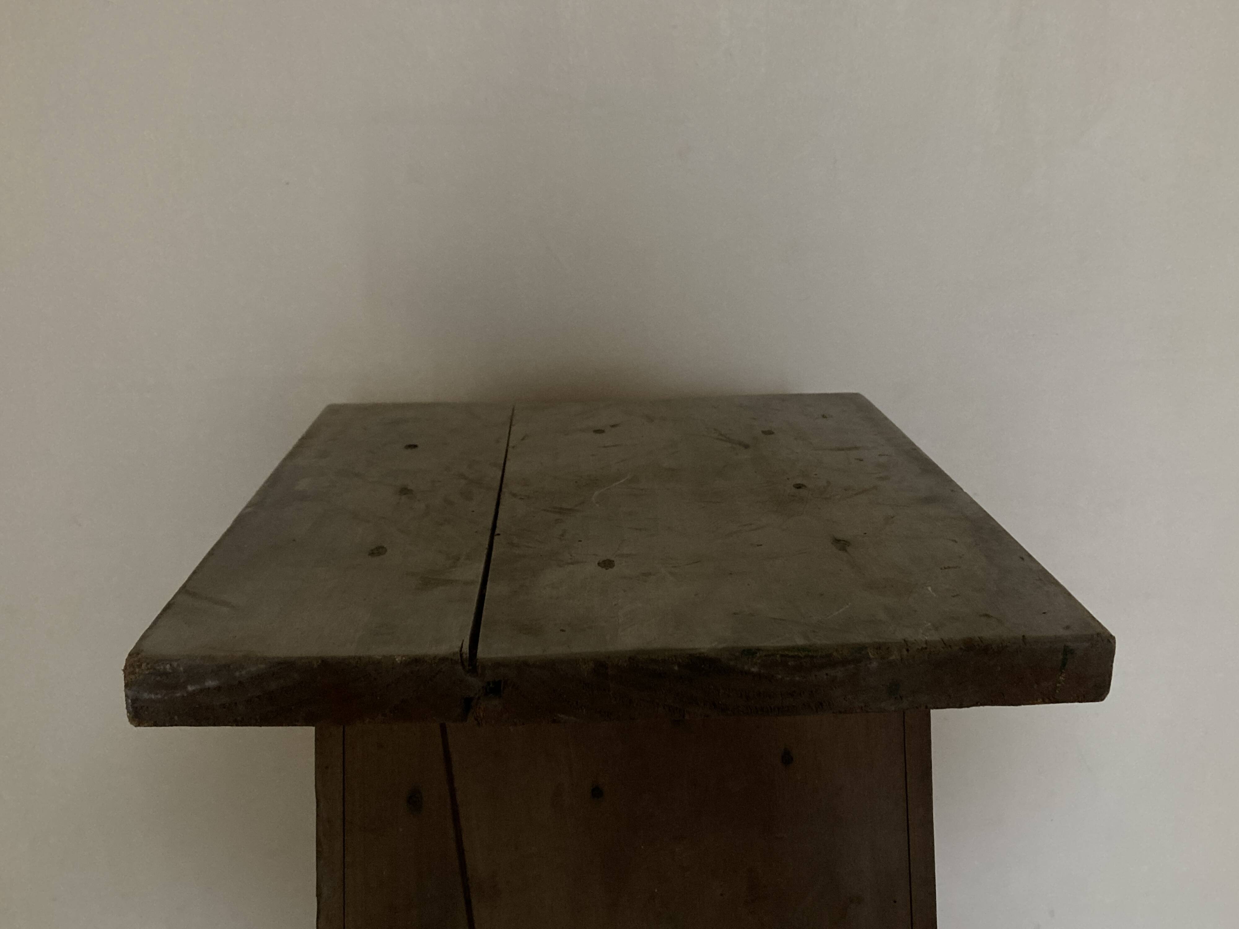 Old neo-classical workshop stool in washed wood h130cm