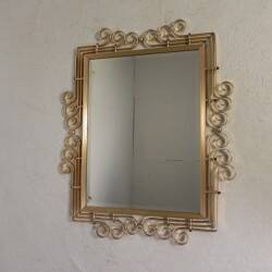 Vintage faceted mirror in an aluminium frame