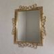 Vintage faceted mirror in an aluminium frame