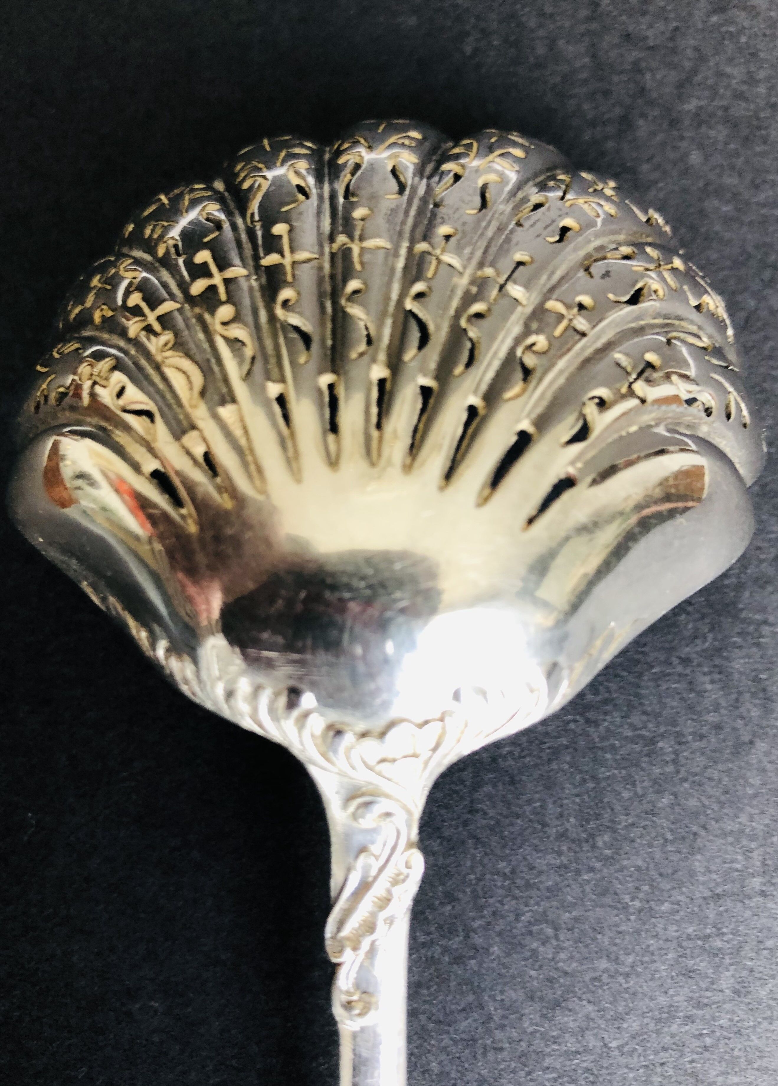 Silver sprinkling spoon