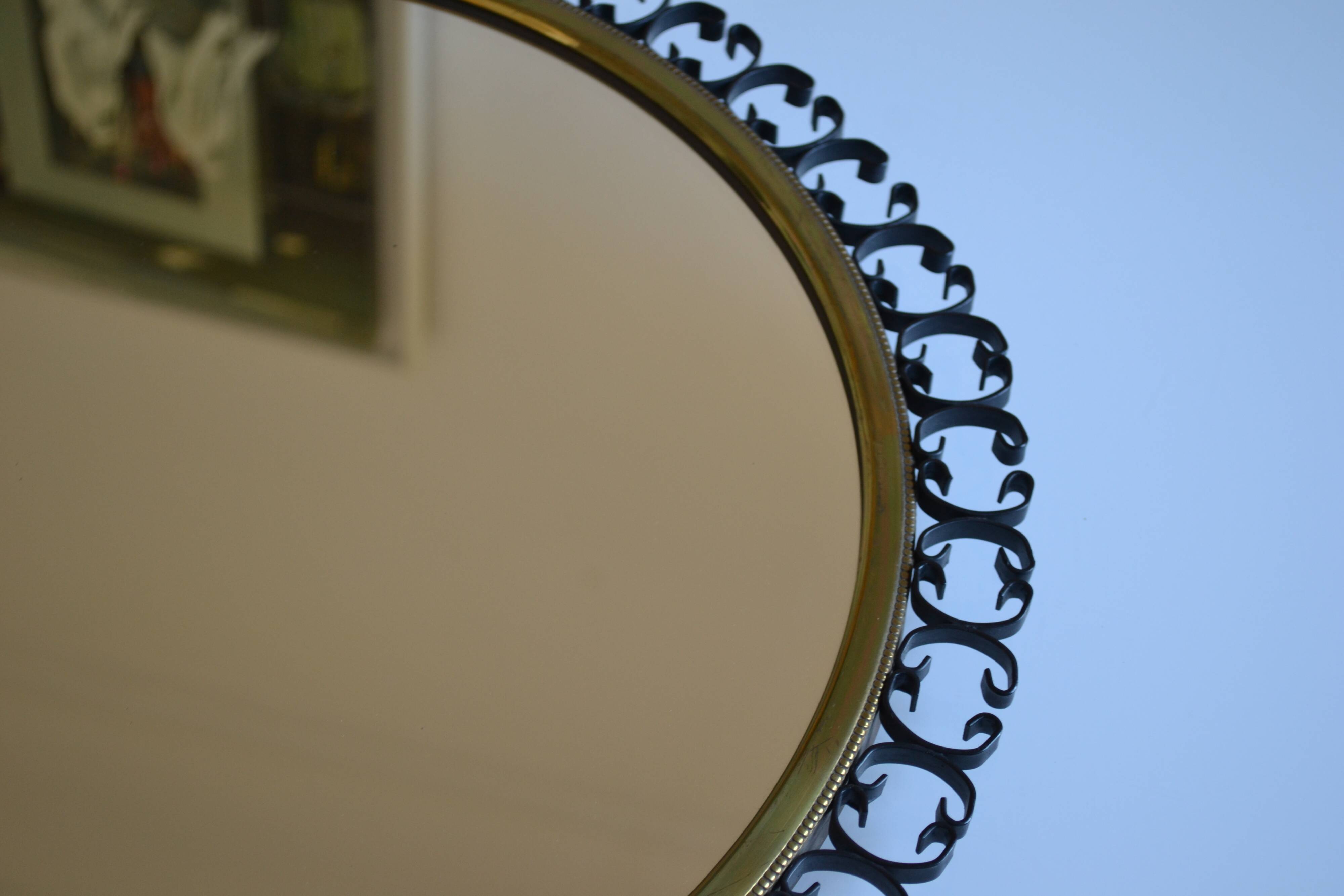 1960s brass and wrought iron sun mirror