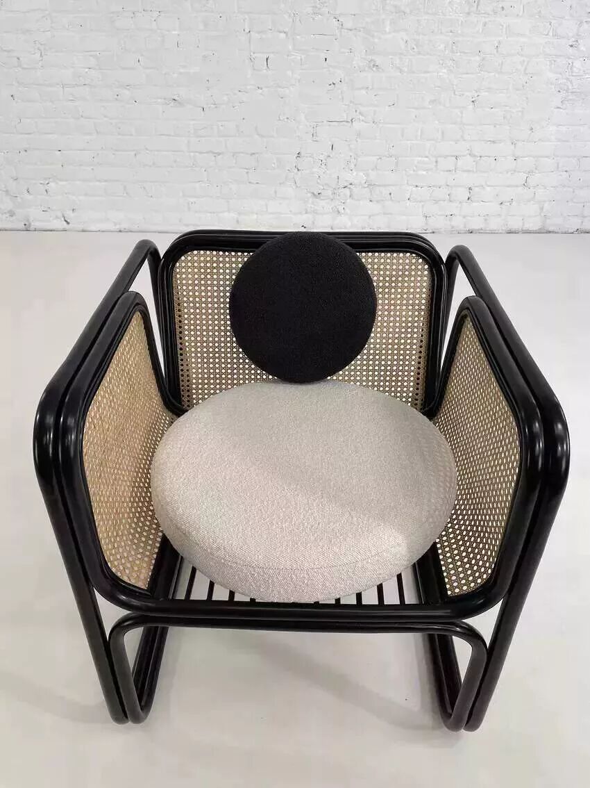 Cubic armchair in black rattan and canework
