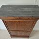 Mahogany secretary desk with marble top and interior mirror.