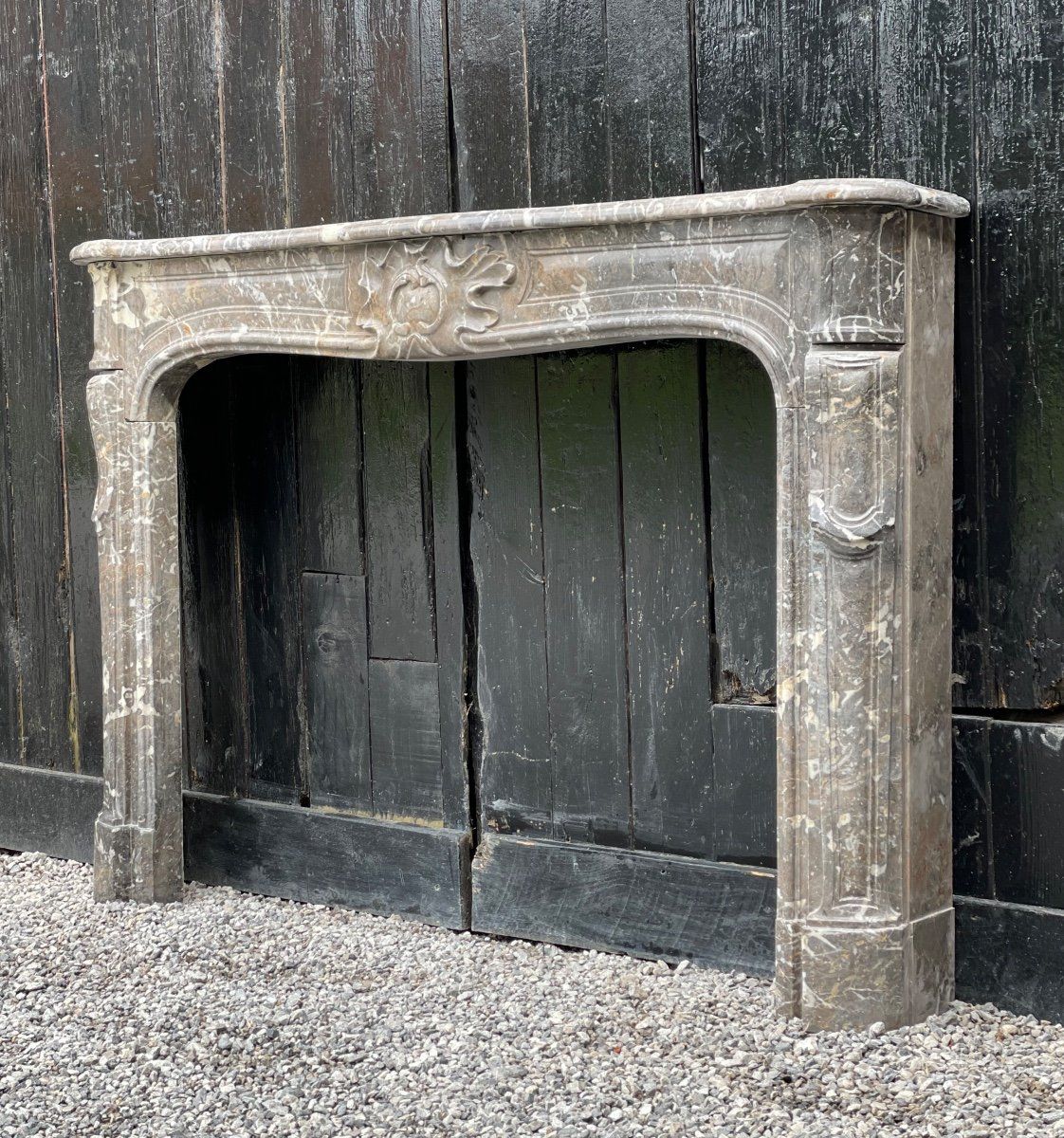 Fireplace louis xv in grey marble of the ardennes late eighteenth century