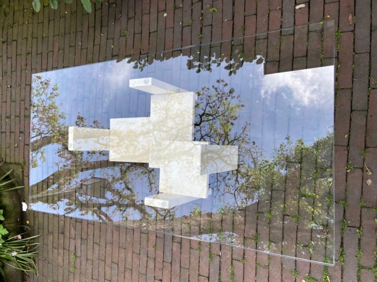 Coffee table by Willy Ballez in travertine