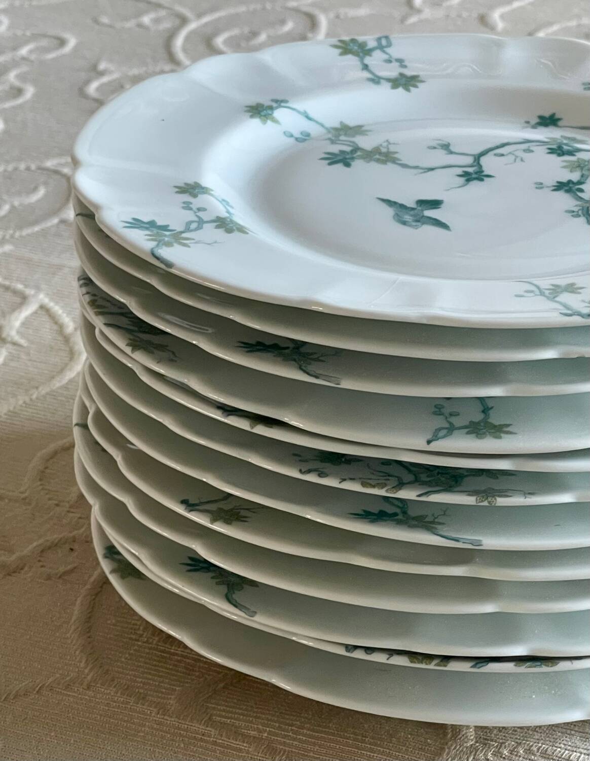 12 Haviland Limoges dessert plates.
