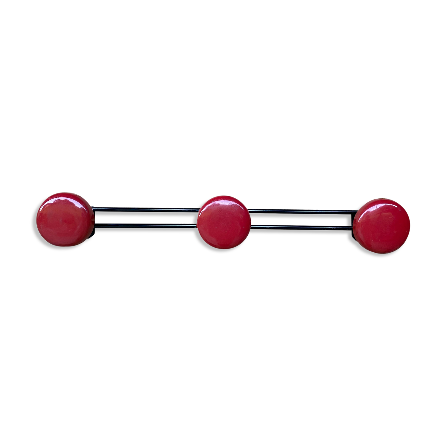 Wall coat holder in vintage red metal.