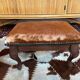 Vintage wooden and goatskin pouf