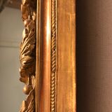 Large antique mirror with flagship shell in wood and gilded stucco