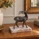 Vintage antelope gazelle bookend in patinated metal on a marble base.