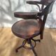 Swivel wooden armchair, pattern on seat