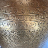 Copper lamp with raffia lampshade