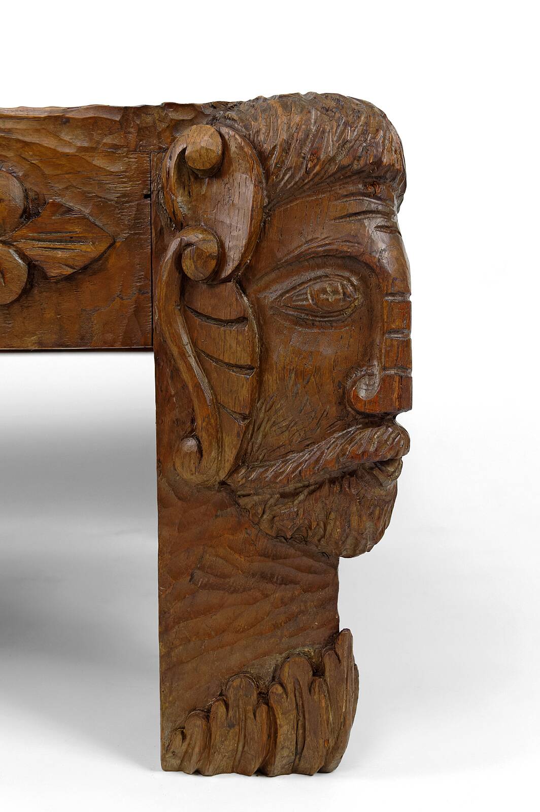 Solid oak coffee table carved with fauns and gray marble top, France, circa 1940