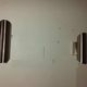 Pair of stainless steel tube wall lights from the 70s/80s
