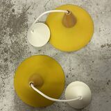 Duo of yellow glass pendant lamps