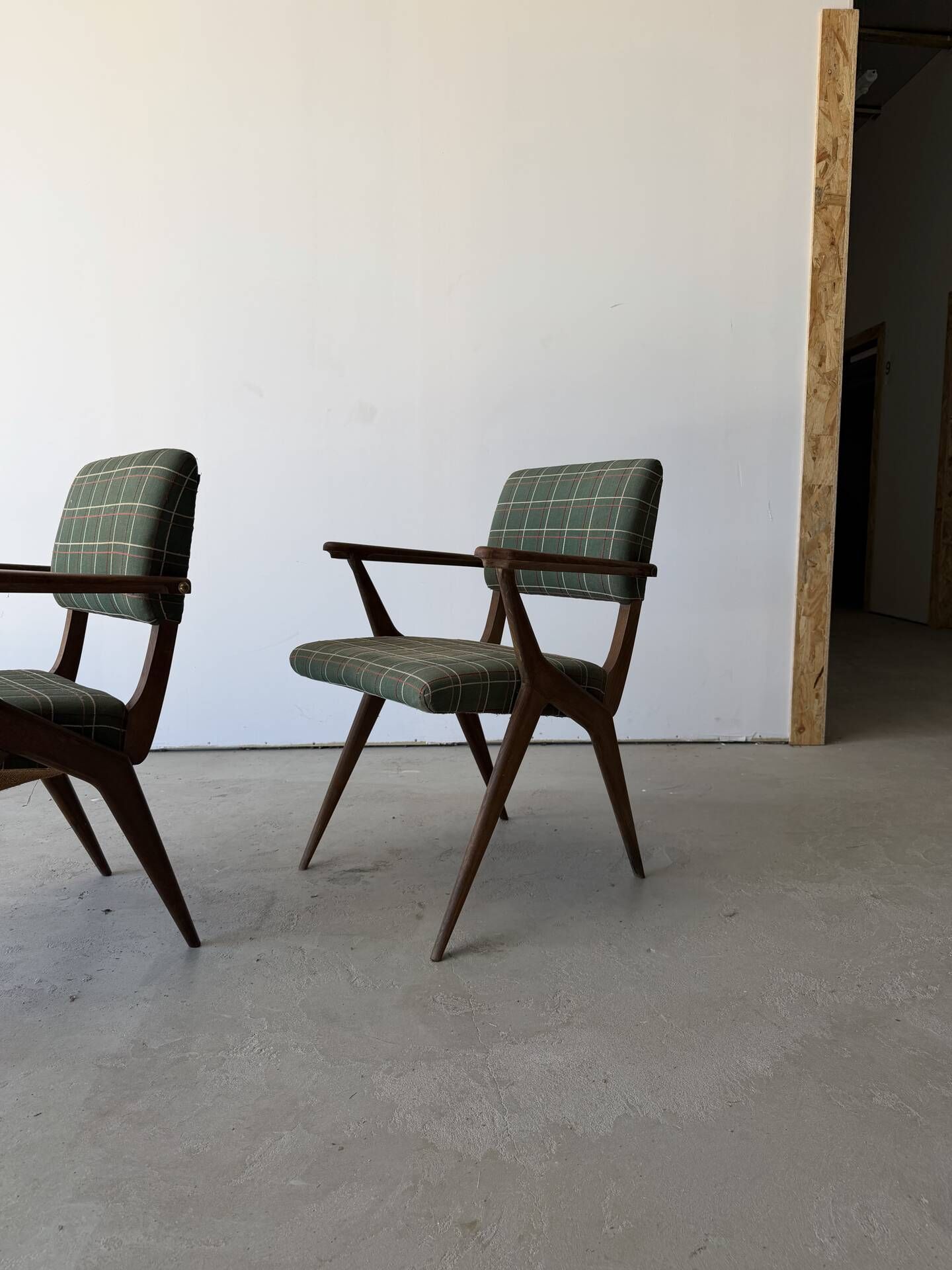 Pair of armchairs with a Scandinavian design in vintage teak from the 1960s.