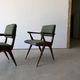 Pair of armchairs with a Scandinavian design in vintage teak from the 1960s.