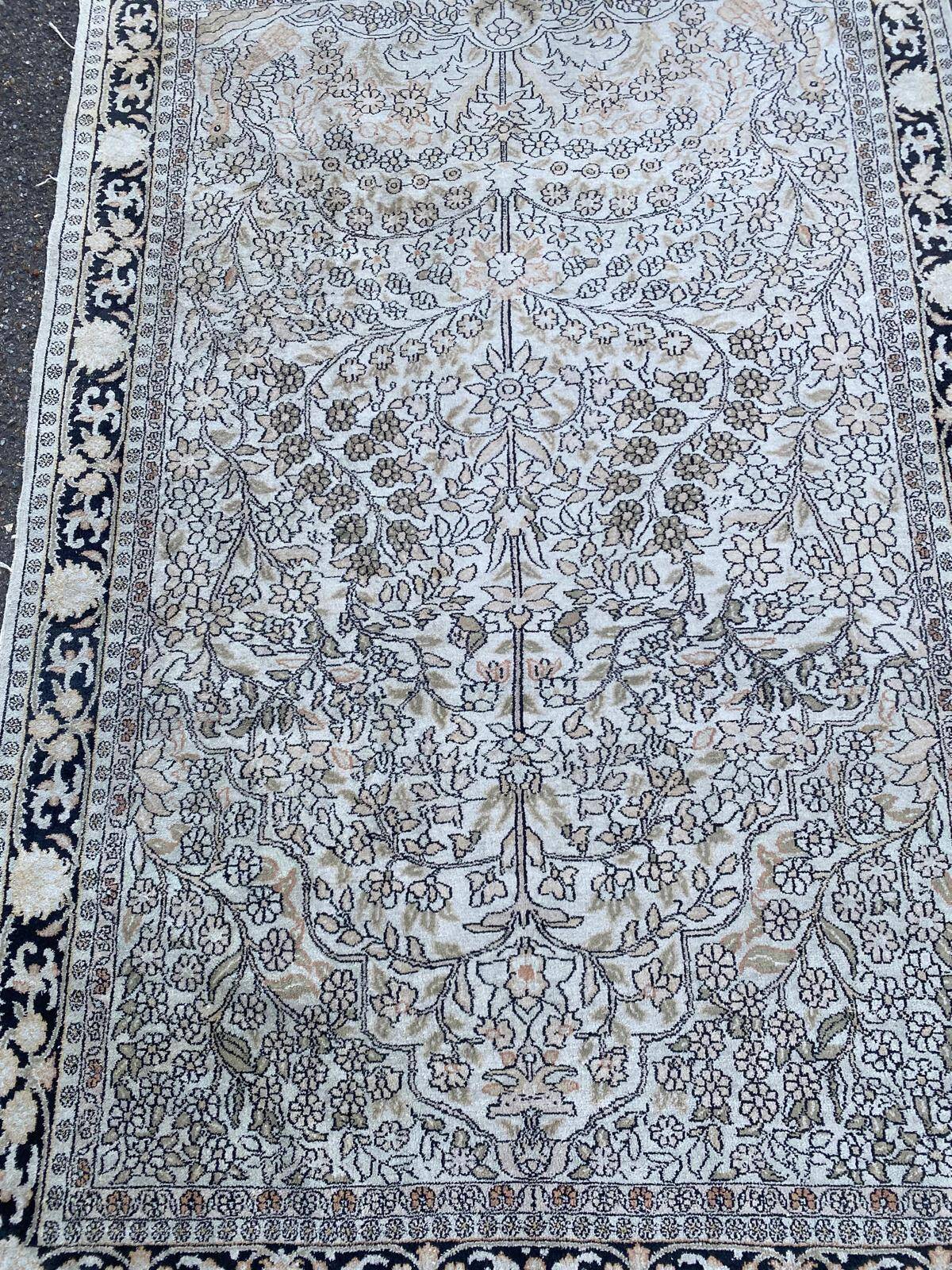 Handmade beige wool Persian rug 130x200