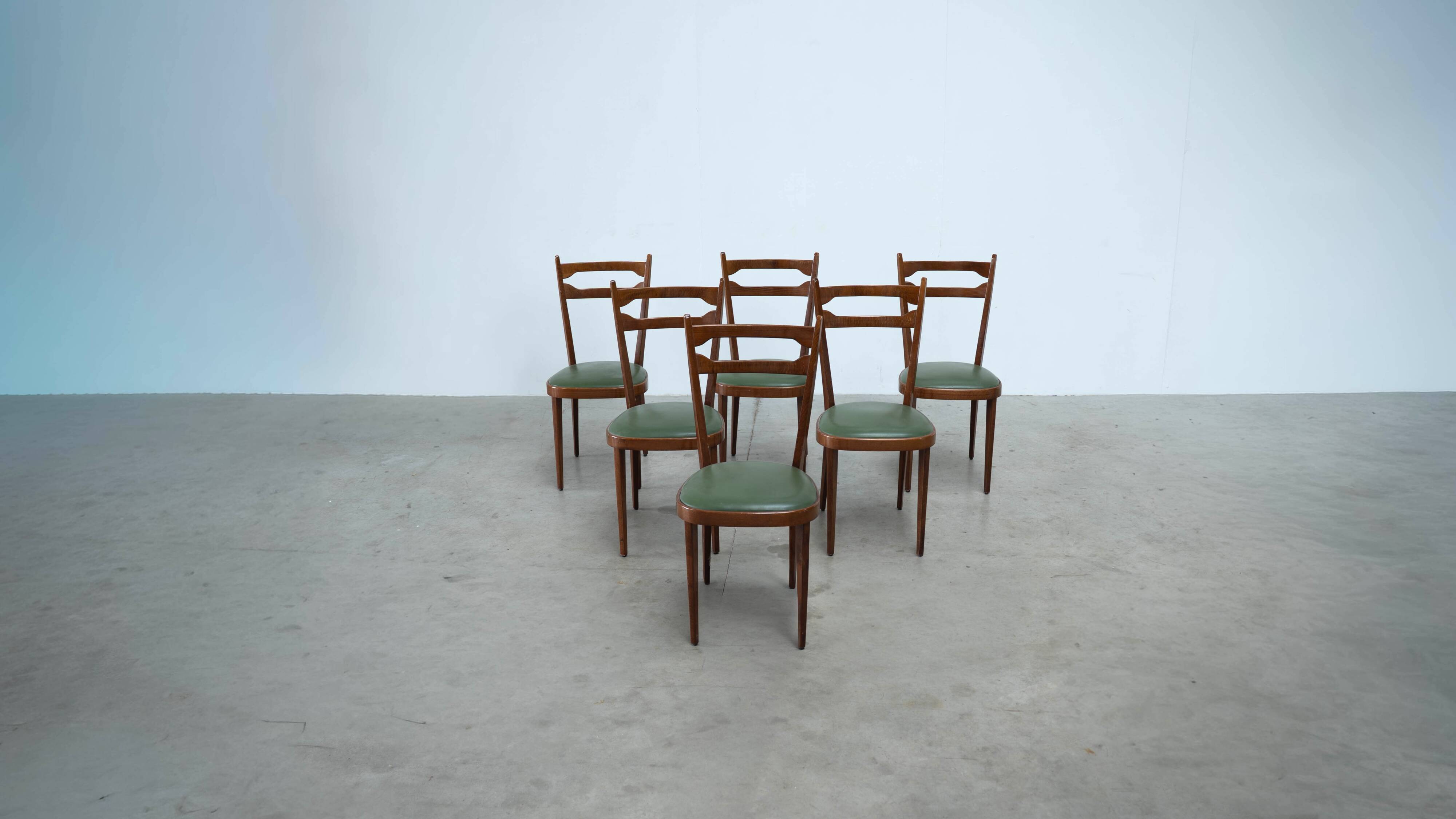 Set of six elegant Italian dining chairs