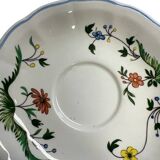 Gien earthenware saucer, decorated with birds of paradise.