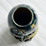 Very colorful glazed earthenware vase, old vase with floral decoration.