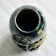 Very colorful glazed earthenware vase, old vase with floral decoration.