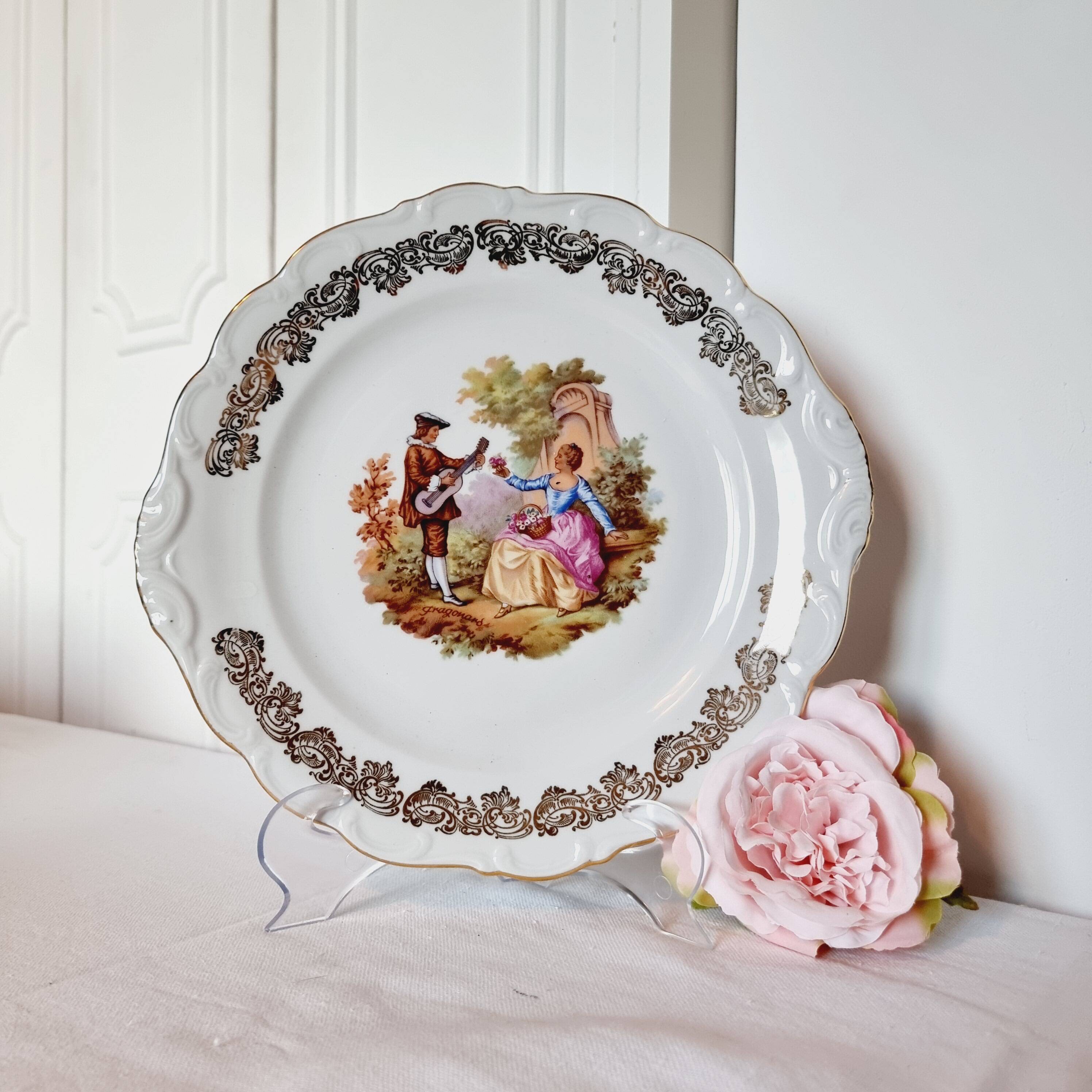 Large serving plate with romantic Frangonard scene with 24 carat gold