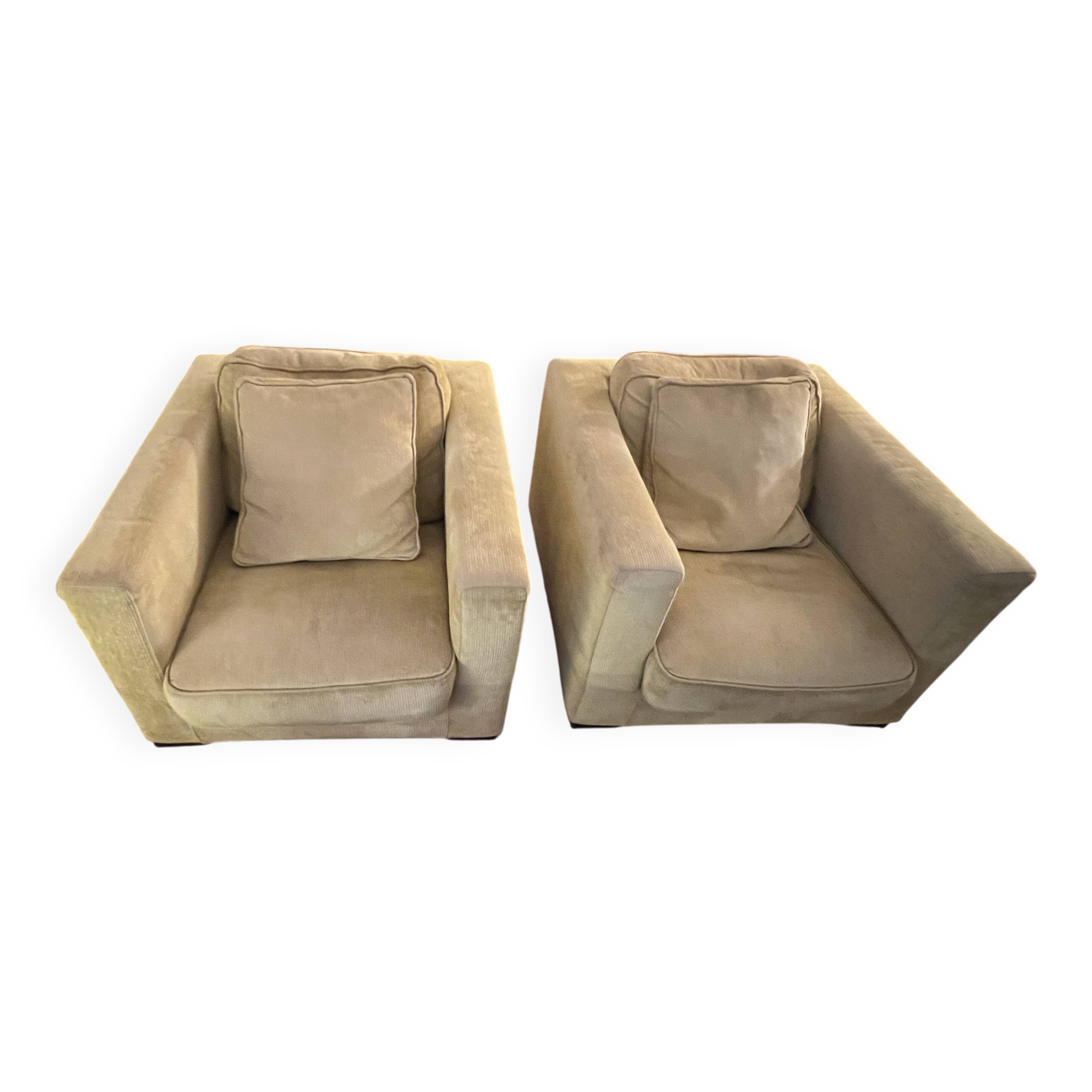 Two yellow Roche Bobois Longislande armchairs.