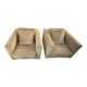 Two yellow Roche Bobois Longislande armchairs.
