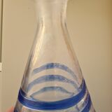 Conical glass vase/carafe blown with a blue spiral decoration.
