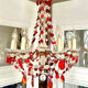 Antique chandelier with red crystal pendants, 9 lights.