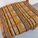 Vintage sled chair by Baumann in wood and wool fabric.