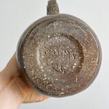 Brown handcrafted stoneware pitcher, natural finish, rustic style