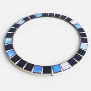 Round mosaic mirror in the style of Vallauris, France circa 1970.