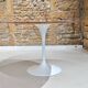 Round table in red marble by Eero Saarinen for Knoll